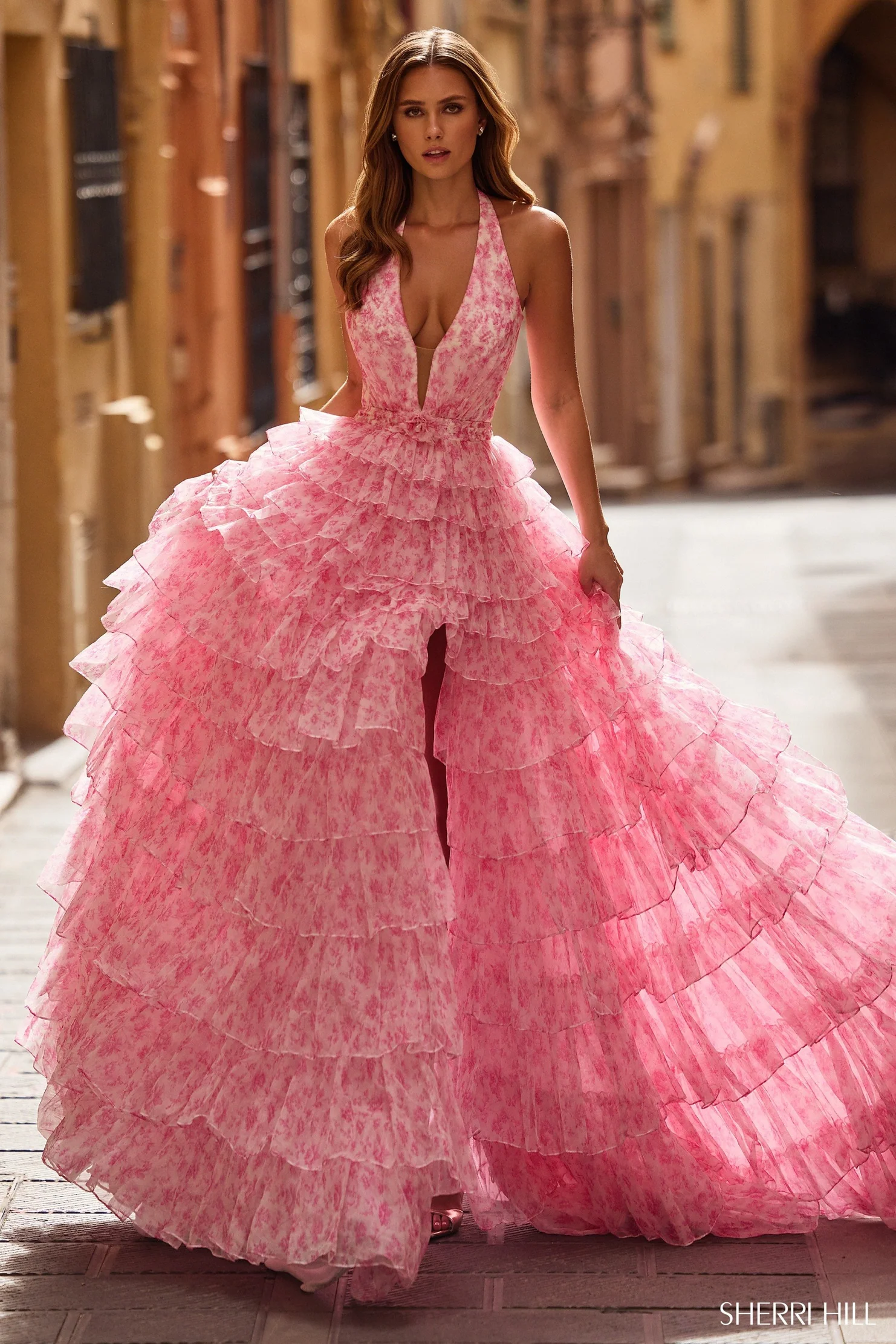 model wearing pink Sherri Hill dress